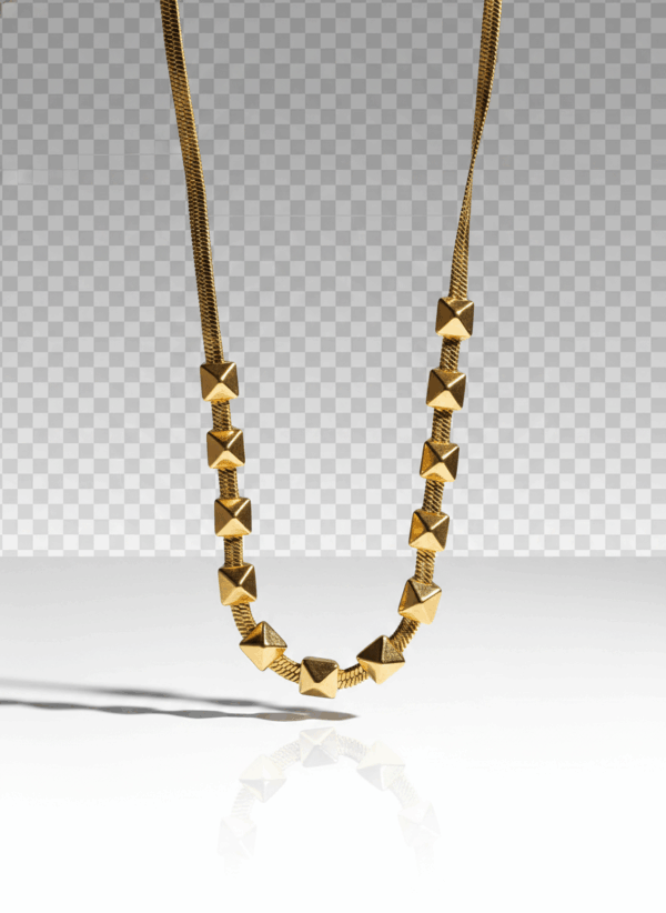 Collar Dorado con Relieve de Cuadros