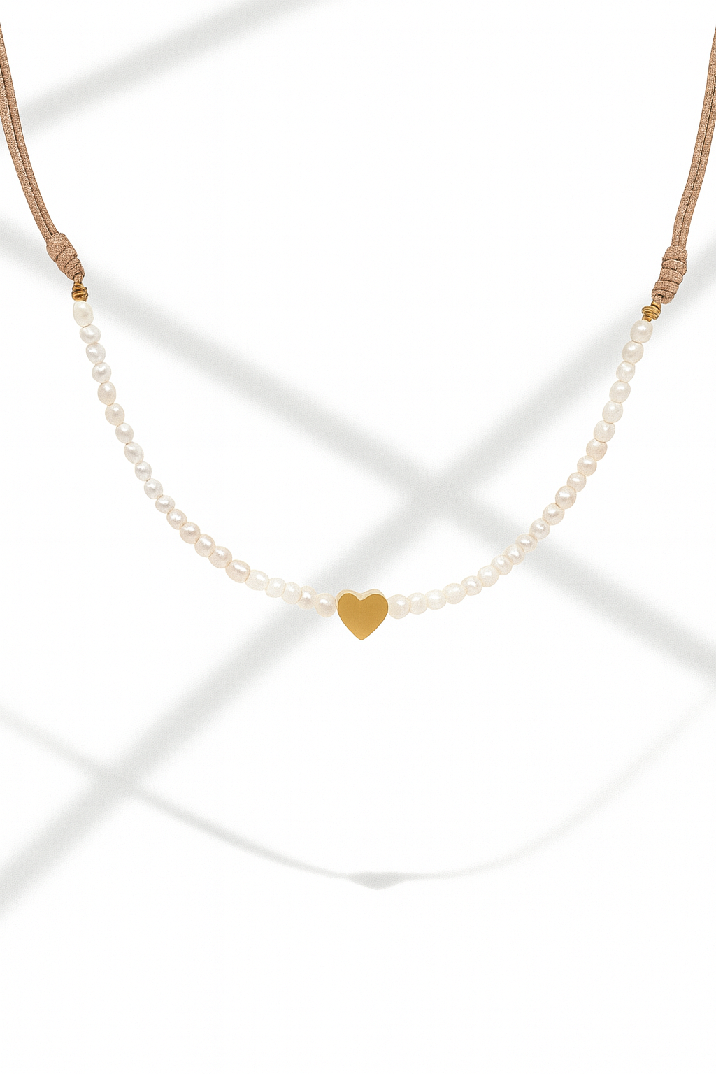 Collar corazon con perlas de rio