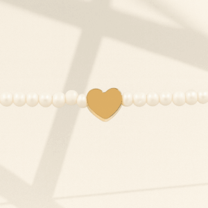 Pulsera corazon dorado con perlas de rio