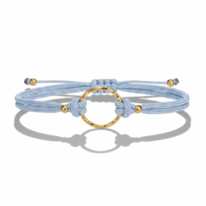 Pulsera aro dorado enlazado con cordon azul