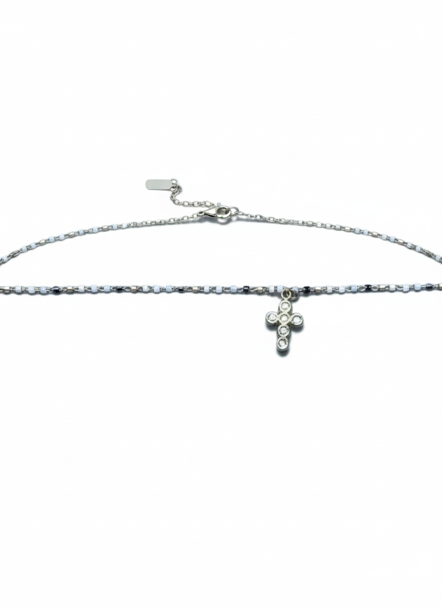 Pulsera con pequeña cruz dorada con circonitas